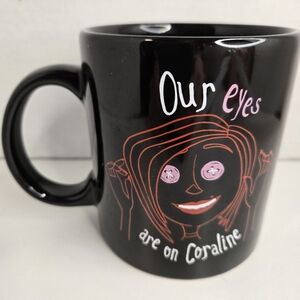 2020 Laika Our Eyes Are On Coraline Mug with Pink and Red Design On Black